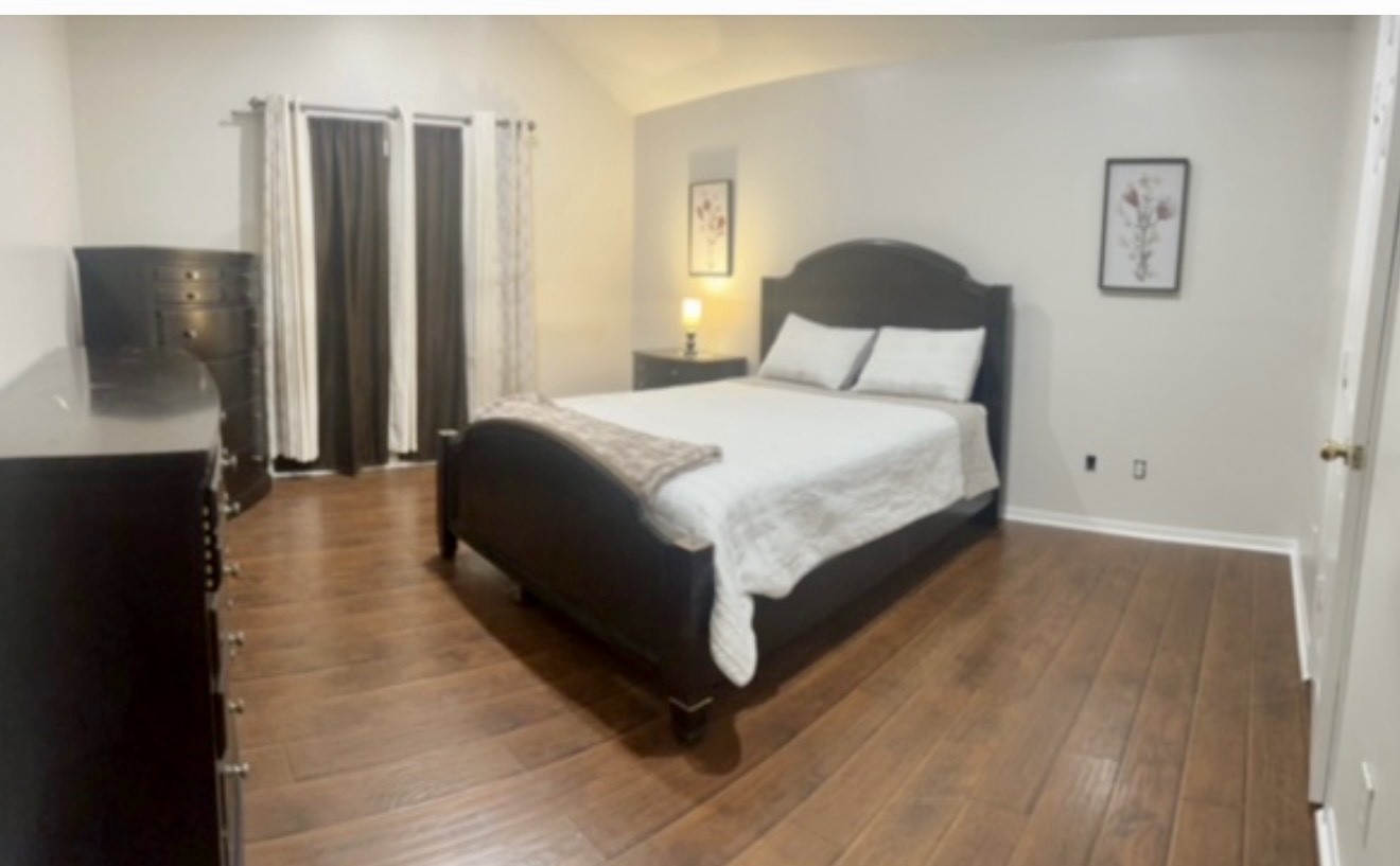 19331 Grand Colony Court Katy, TX 77449 - Photo 12 of 14 a large bed sitting in a bedroom next to a window