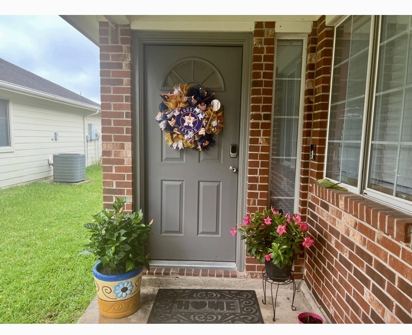 19331 Grand Colony Court Katy, TX 77449 - Photo 2 of 14 a vase of flowers sitting on a floor