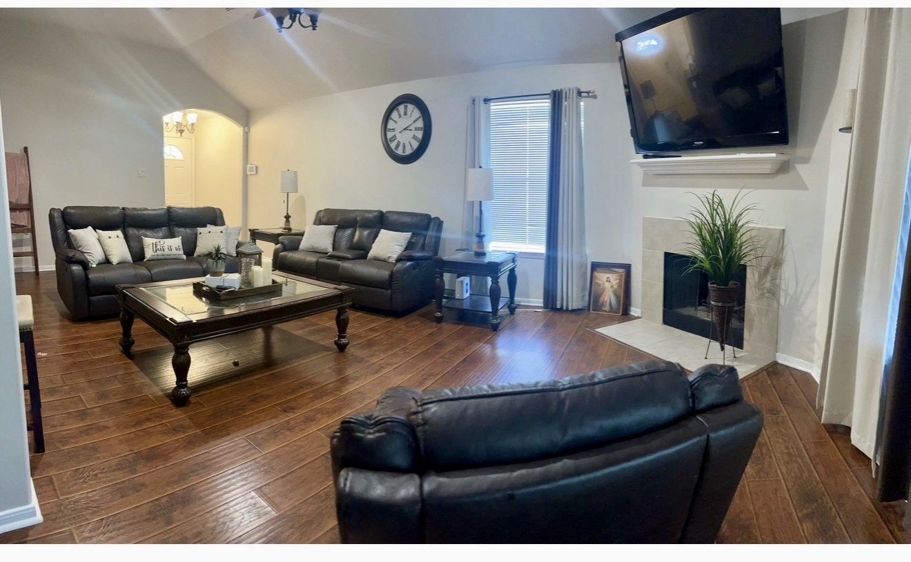 19331 Grand Colony Court Katy, TX 77449 - Photo 6 of 14 a living room with furniture and a flat screen tv
