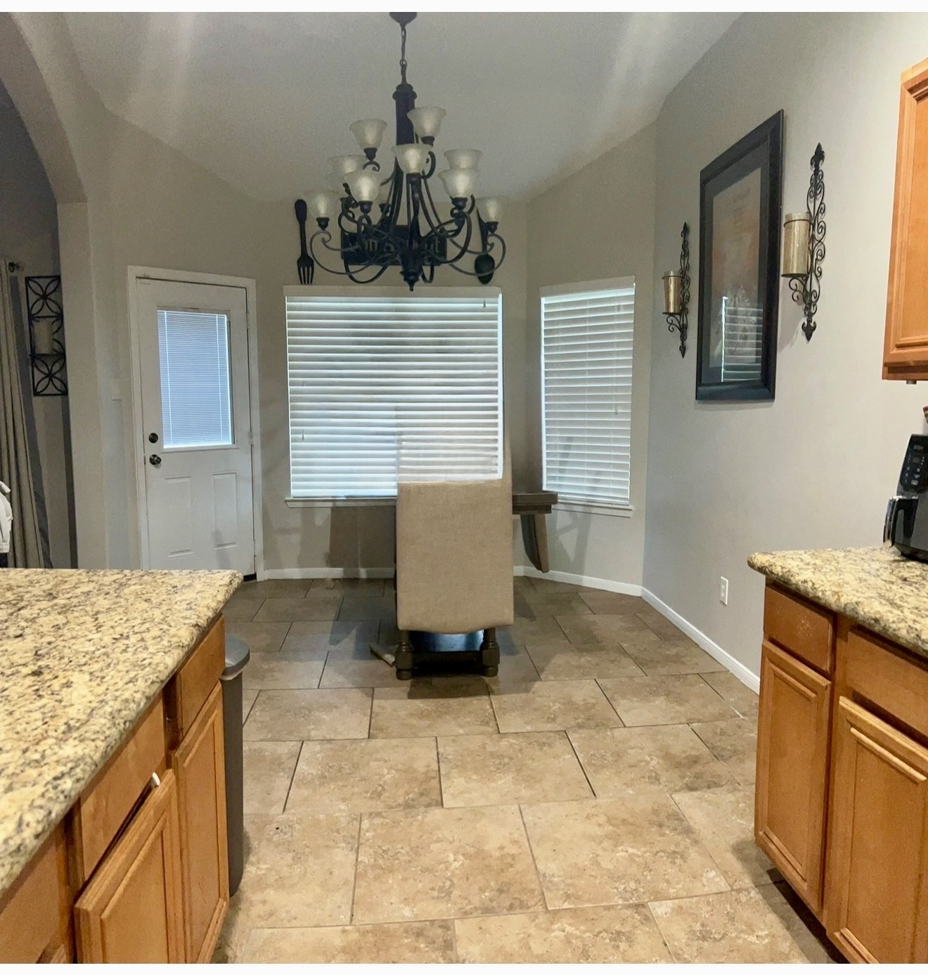 19331 Grand Colony Court Katy, TX 77449 - Photo 8 of 14 a living room with granite countertop furniture and a chandelier