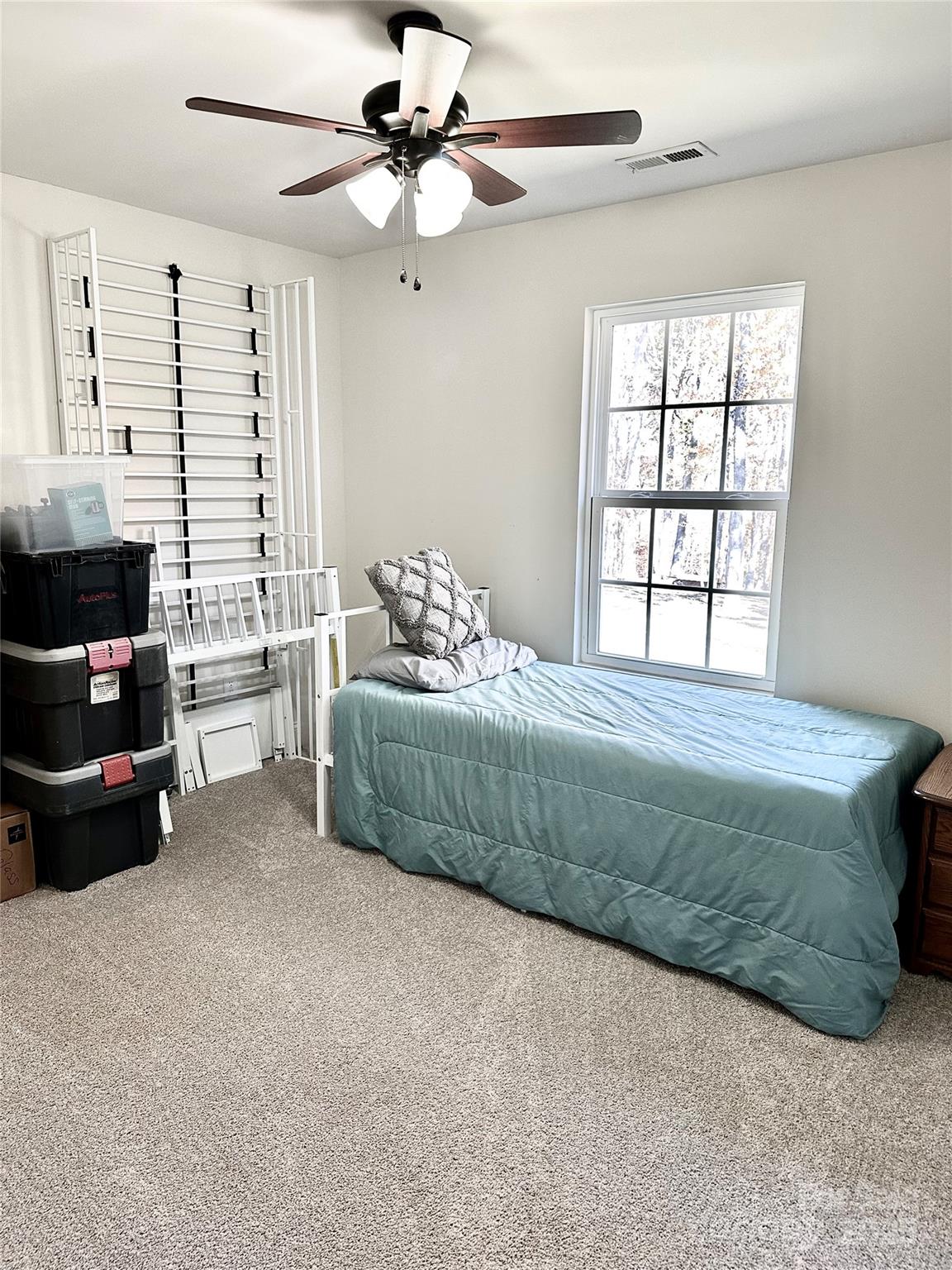 2944 Ranger Road Clover, SC 29710 - Photo 14 of 23 a bedroom with a bed a couch and a window