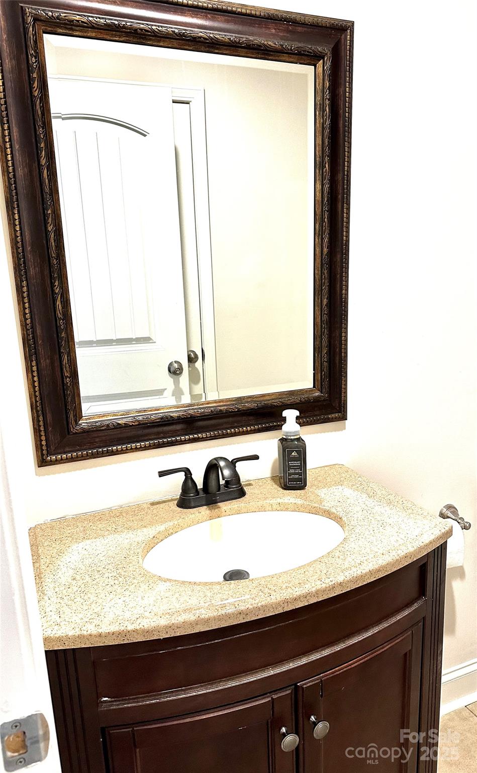 2944 Ranger Road Clover, SC 29710 - Photo 15 of 23 a bathroom with a sink and a mirror