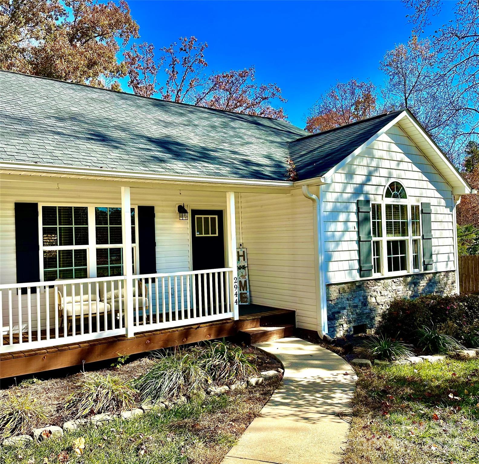 2944 Ranger Road Clover, SC 29710 - Photo 2 of 23 a view of a house with a small yard and wooden fence