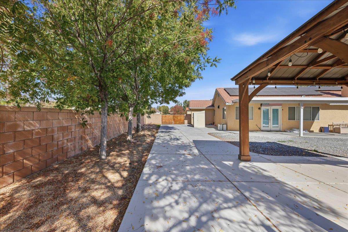 15358 Lookout Road Apple Valley, CA 92307 - Photo 20 of 30 a view of a house with a small yard