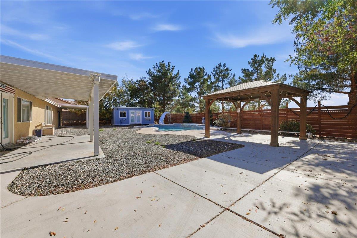 15358 Lookout Road Apple Valley, CA 92307 - Photo 21 of 30 a view of a house with a yard
