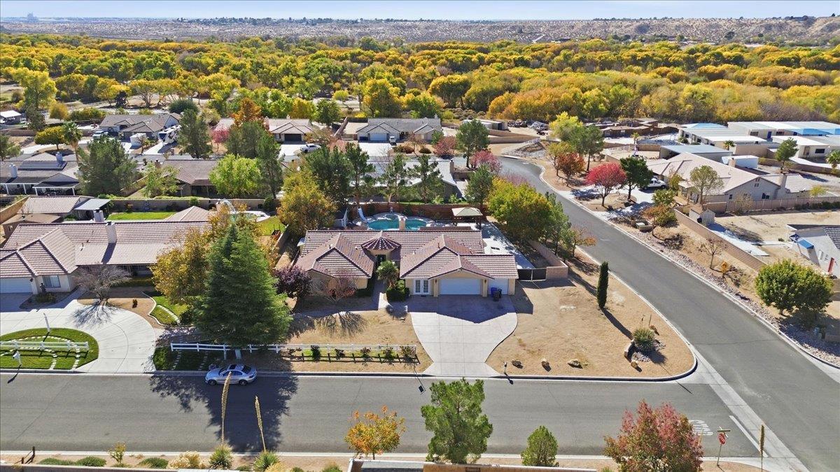 15358 Lookout Road Apple Valley, CA 92307 - Photo 30 of 30 an aerial view of residential houses with outdoor space