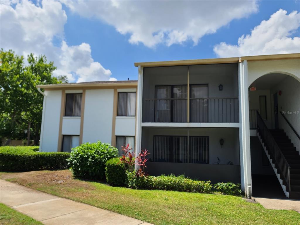 8207 Sun Spring Circle, Unit 82 Orlando, FL 32825 - Photo 1 of 1 View from outside. Apartment on second floor.