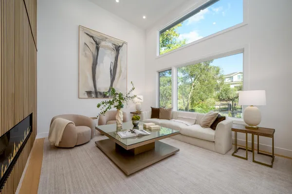 a view of a dining room with furniture window and outside view