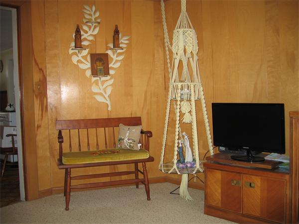 26 Wintworth Street Chicopee, MA 01013 - Photo 12 of 13 a living room with a flat screen tv and a lamp