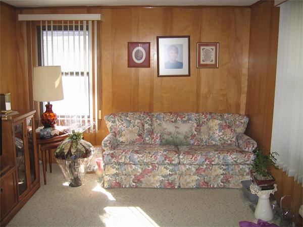 26 Wintworth Street Chicopee, MA 01013 - Photo 10 of 13 a living room with furniture and a window