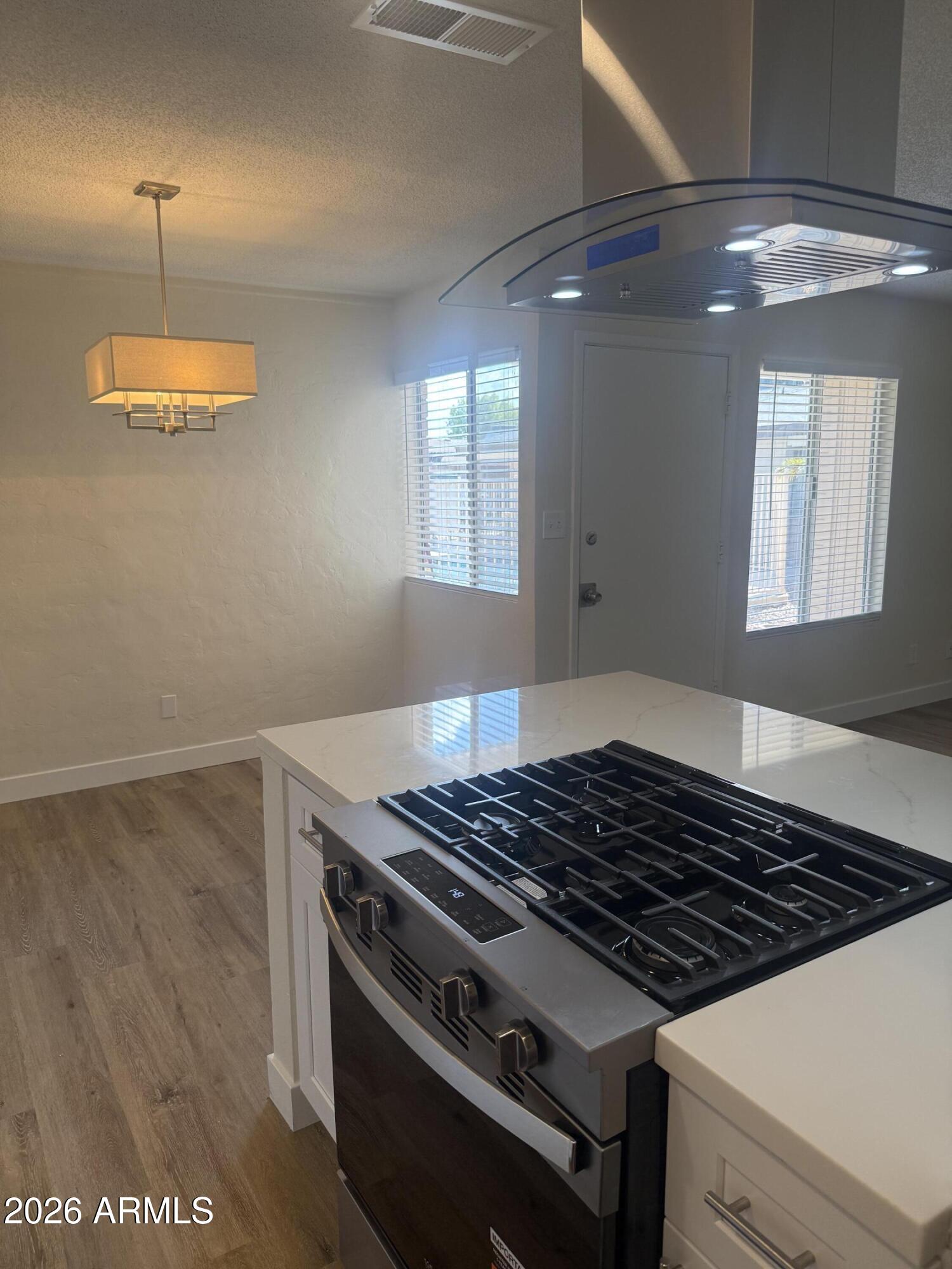 1622 East Campbell Avenue, Unit R Phoenix, AZ 85016 - Photo 7 of 22 1622 East Campbell Avenue Kitchen and Di