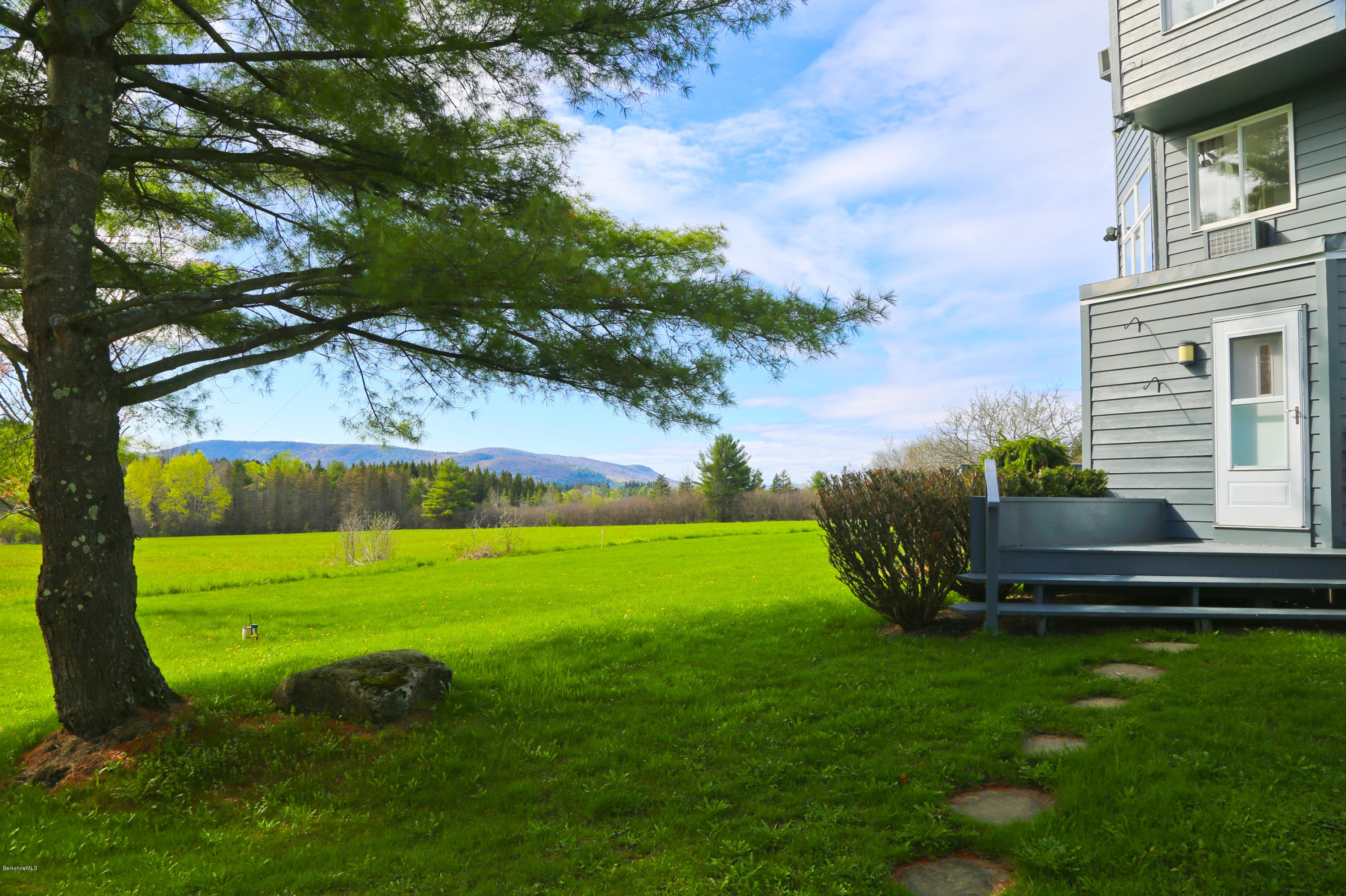 29 Rattlesnake Mountain Road Stockbridge, MA 01262 - Photo 14 of 21 a garden view with a seating space
