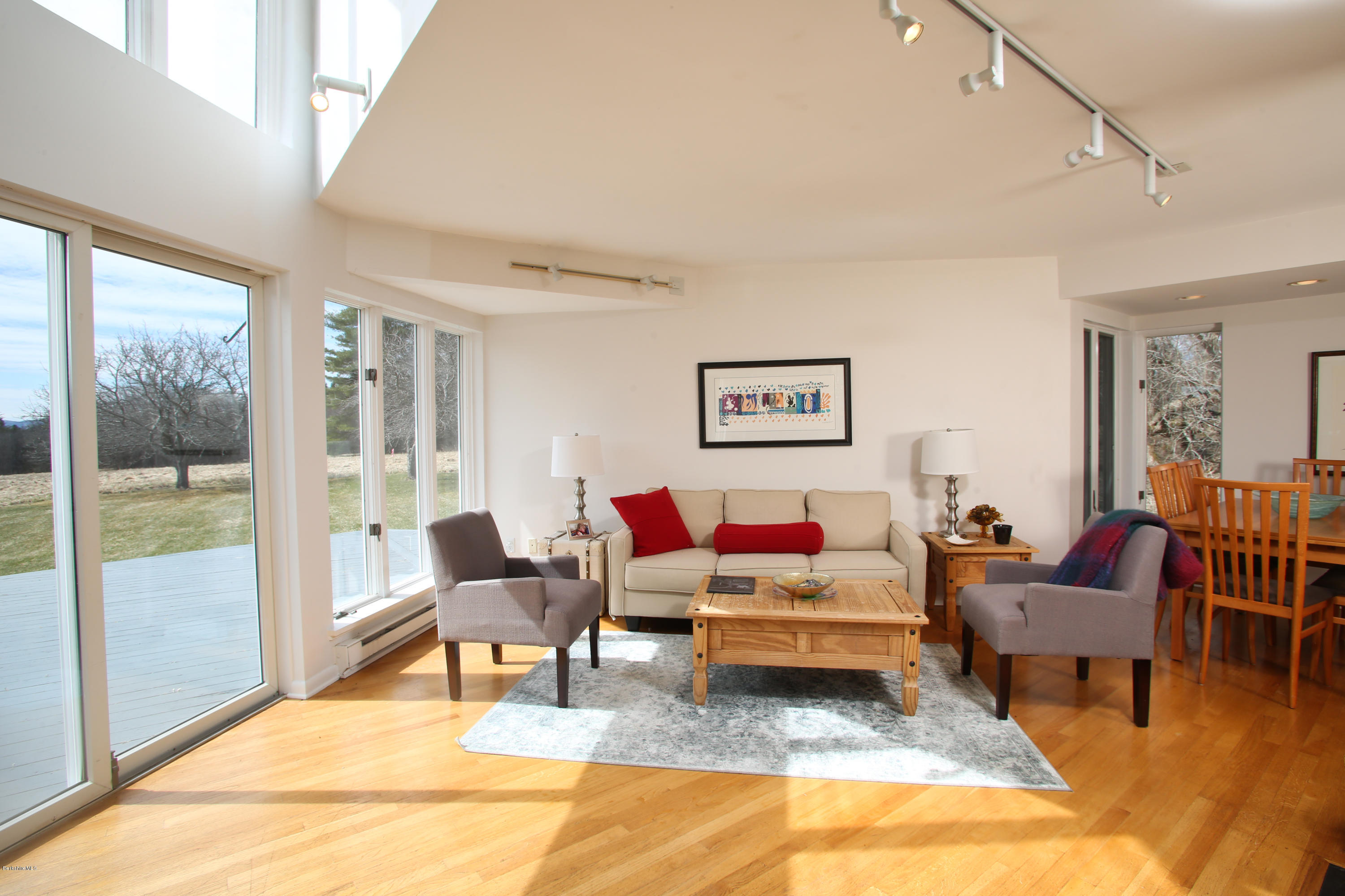 29 Rattlesnake Mountain Road Stockbridge, MA 01262 - Photo 5 of 21 a living room with furniture and a floor to ceiling window