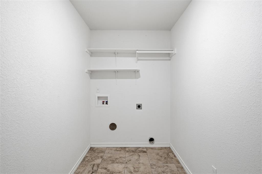 37 Buckskin Loop Belton, TX 76513 - Photo 12 of 25 a view of walk in closet with clothes