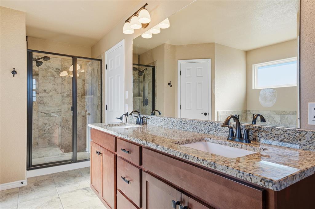 37 Buckskin Loop Belton, TX 76513 - Photo 16 of 25 a bathroom with a sink double vanity and a mirror