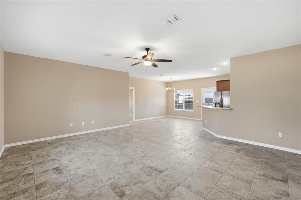 37 Buckskin Loop Belton, TX 76513 - Photo 2 of 25 an empty room with a empty space and a ceiling fan