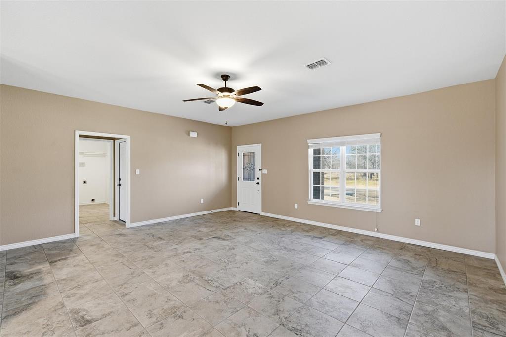 37 Buckskin Loop Belton, TX 76513 - Photo 4 of 25 a view of an empty room with a window