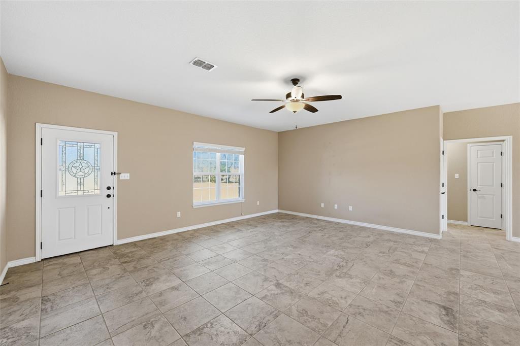 37 Buckskin Loop Belton, TX 76513 - Photo 5 of 25 an empty room with windows and closet