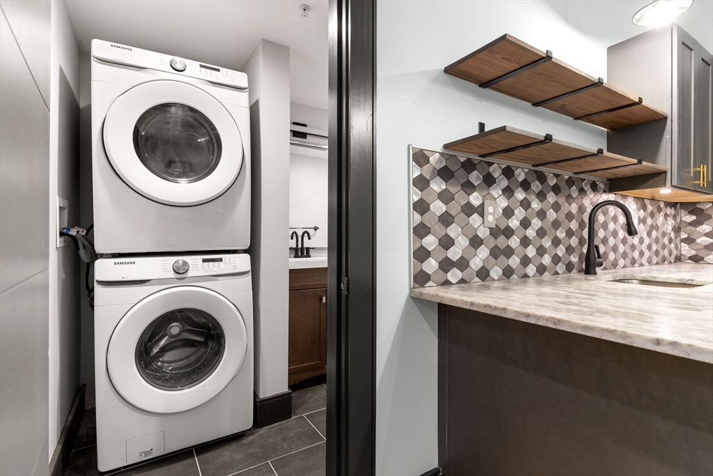 2 Washington Street, Unit 201 Haverhill, MA 01832 - Photo 12 of 16 a utility room with dryer and washer