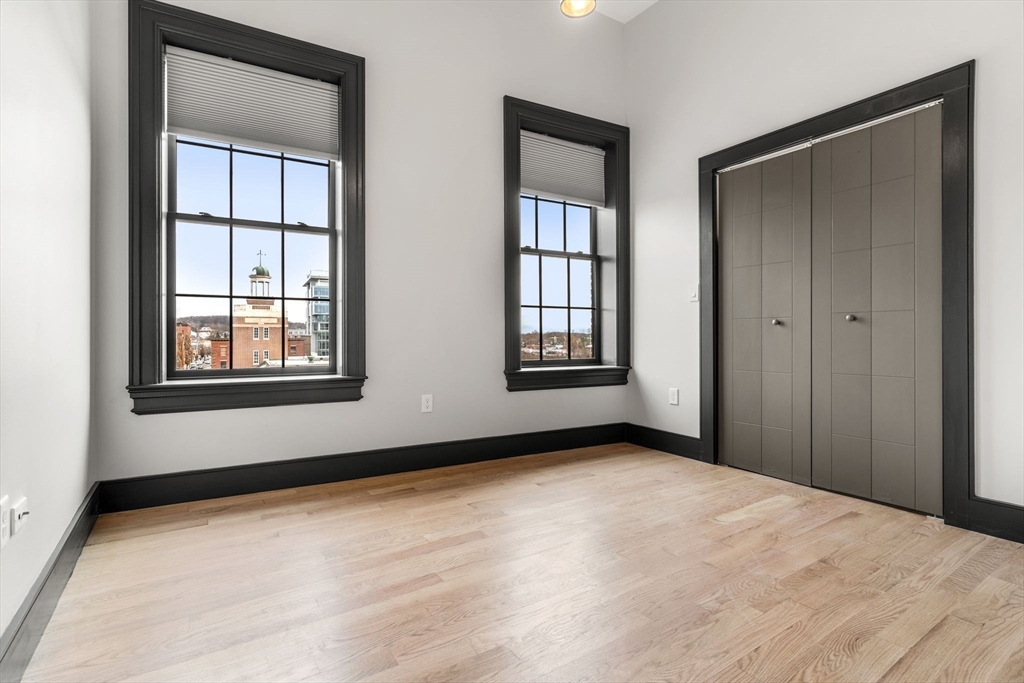2 Washington Street, Unit 201 Haverhill, MA 01832 - Photo 9 of 16 a view of an empty room with a window