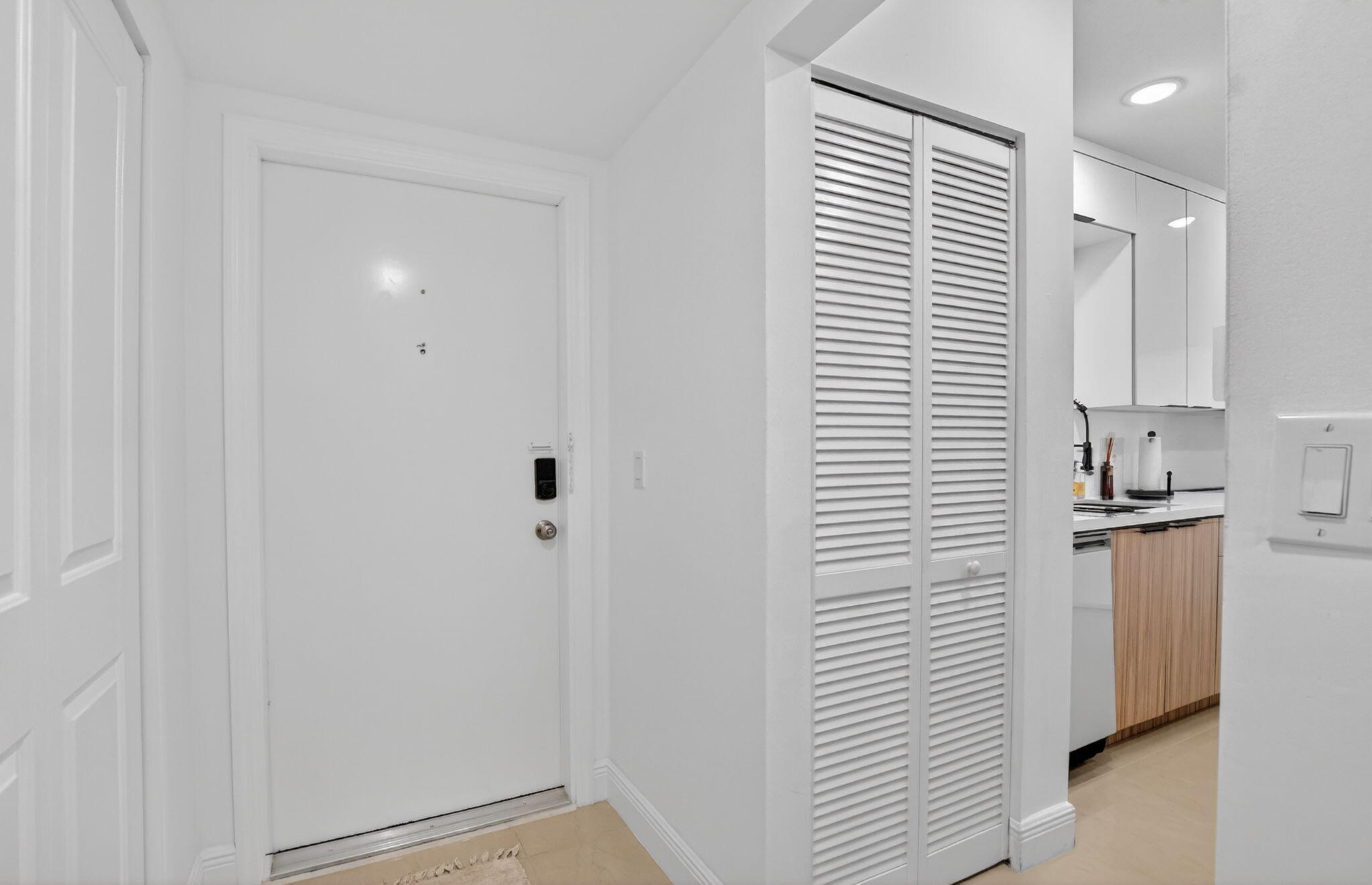 6335 Longboat Lane West, Unit E104 Boca Raton, FL 33433 - Photo 16 of 46 Front door & Hall