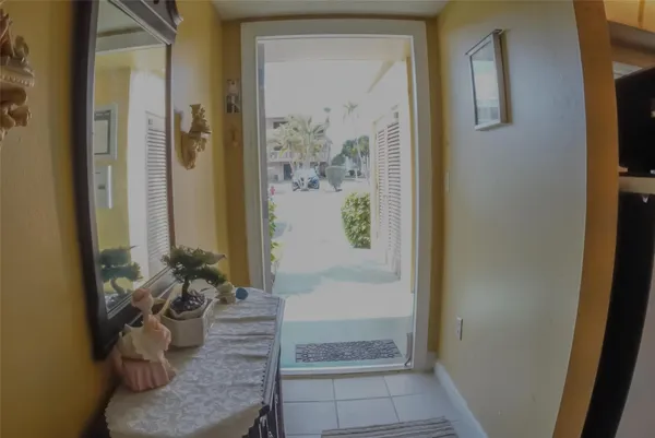 a view of a balcony with furniture