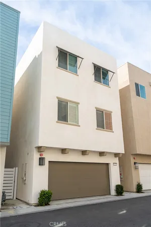 a front view of a building with a road