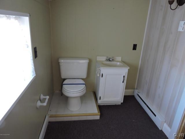 2624 Brookdale Road Scotrun, PA 18355 - Photo 8 of 21 a white toilet sitting next to a sink