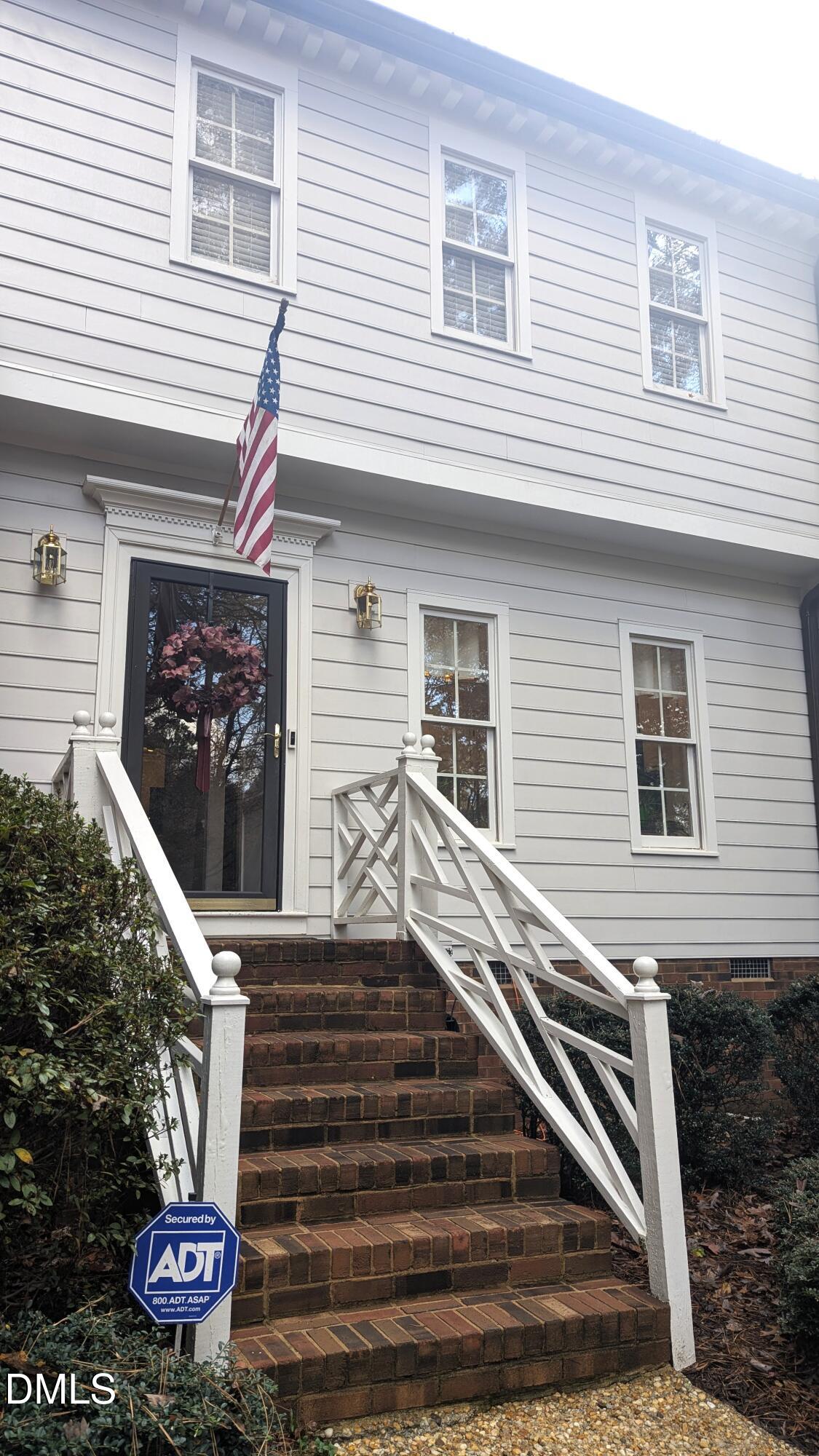 540 Weathergreen Drive Raleigh, NC 27615 - Photo 2 of 20 a front view of house with a garden