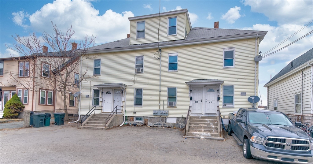 79 Gilbert Street Quincy, MA 02169 - Photo 2 of 38 a view of a patio with table and chairs and a barbeque