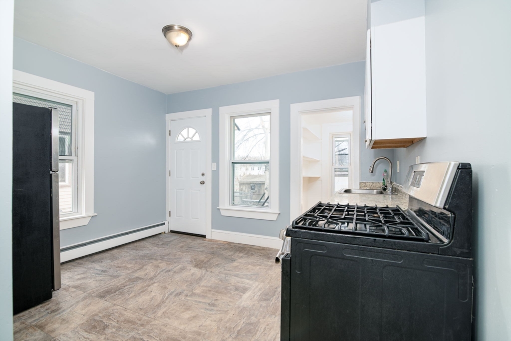79 Gilbert Street Quincy, MA 02169 - Photo 9 of 38 a view of kitchen and sink