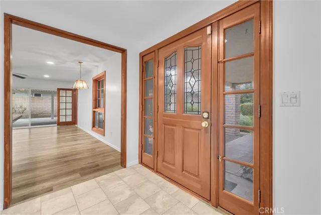 workspace with wooden floor and windows