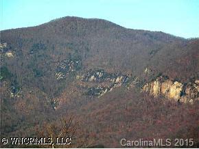 Lot 11 Boulder Ridge Mill Spring, NC 28756 - Photo 1 of 3 a view of a dry yard with mountains in the background
