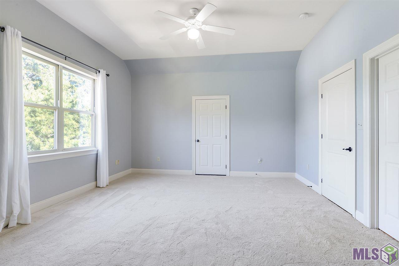3738 Woodland Ridge Boulevard Baton Rouge, LA 70816 - Photo 14 of 16 Huge upstairs bedroom with private bathroom.