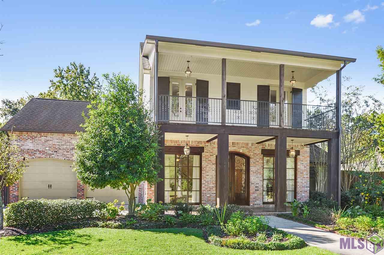 3738 Woodland Ridge Boulevard Baton Rouge, LA 70816 - Photo 2 of 16 Beautiful porch & balcony with pine beams!