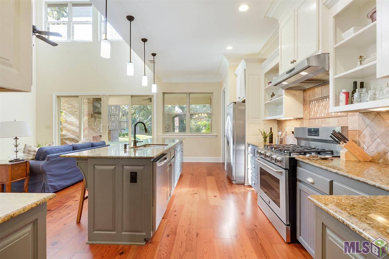3738 Woodland Ridge Boulevard Baton Rouge, LA 70816 - Photo 5 of 16 Chef's dream kitchen with all SS appliances & large island.