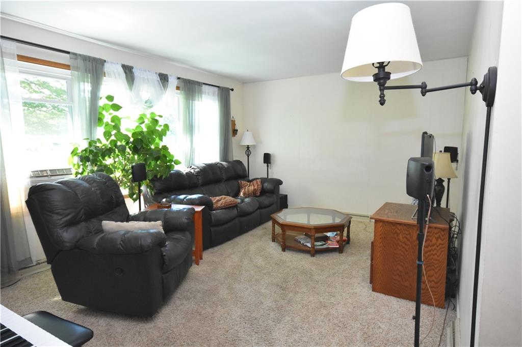 983 Mercer Grove City Road Mercer, PA 16137 - Photo 2 of 19 a living room with furniture and a window