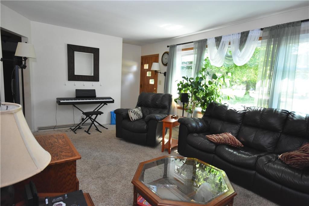 983 Mercer Grove City Road Mercer, PA 16137 - Photo 3 of 19 a living room with furniture and a large window