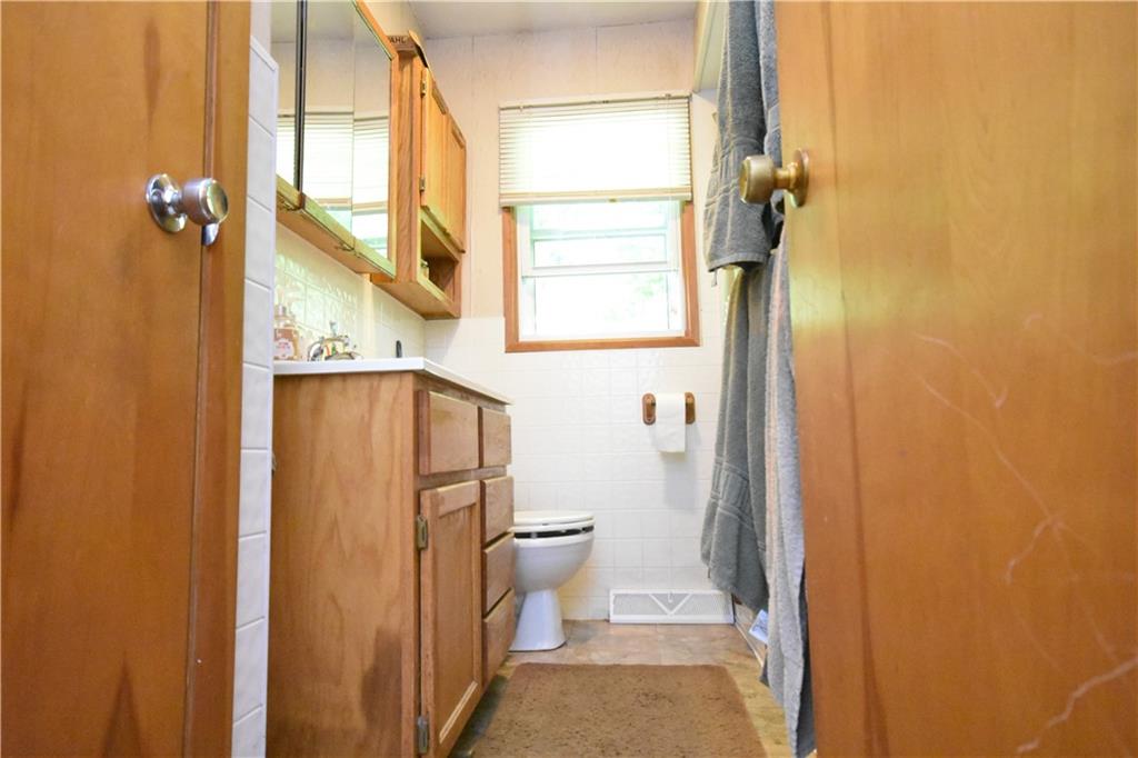 983 Mercer Grove City Road Mercer, PA 16137 - Photo 7 of 19 a bathroom with a sink and toilet