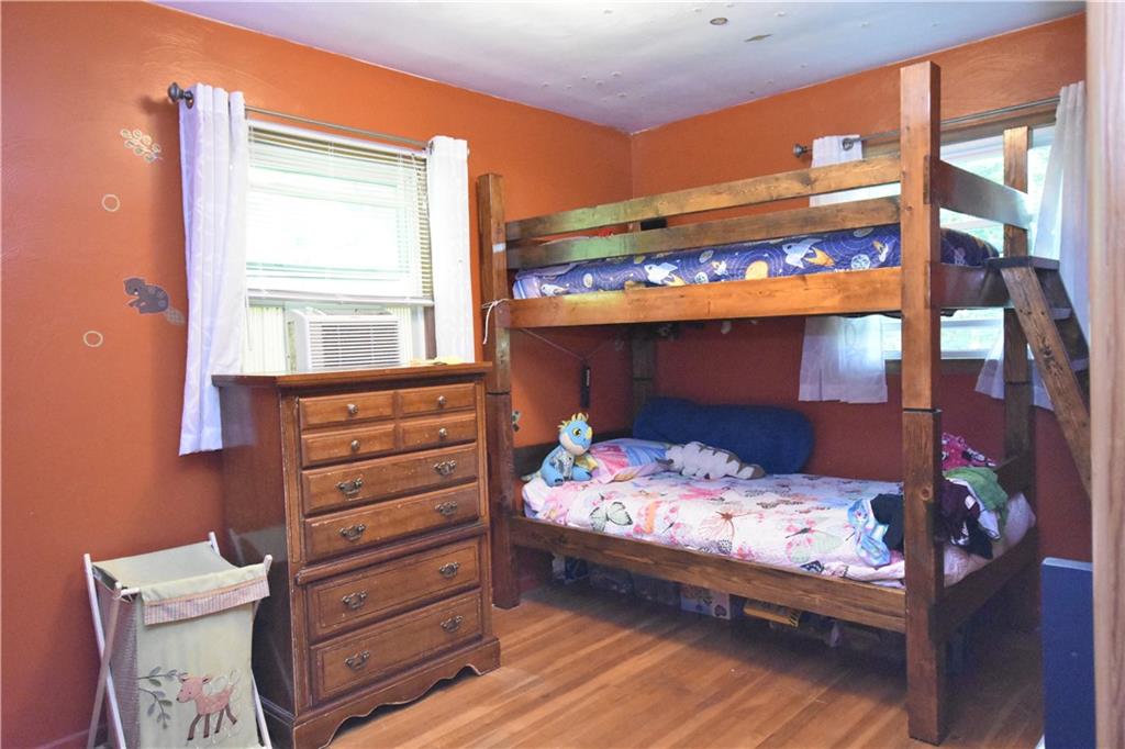 983 Mercer Grove City Road Mercer, PA 16137 - Photo 10 of 19 a bed room with a bed and a window