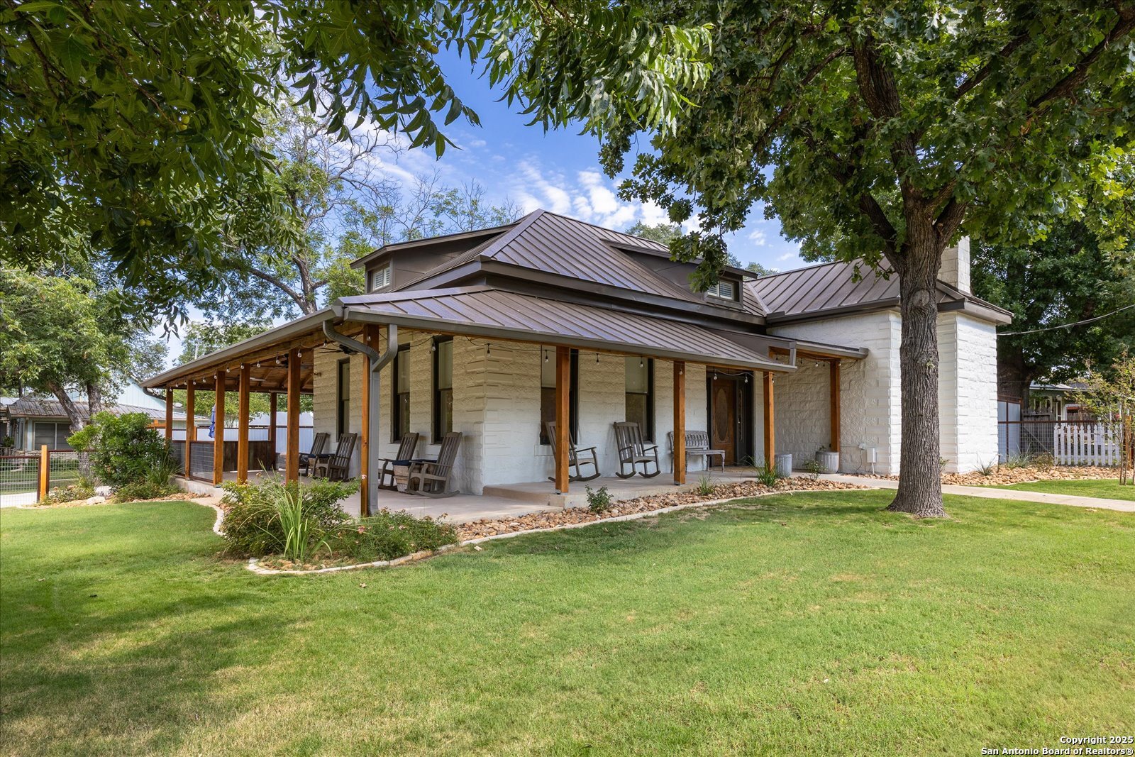 504 6th Street Comfort, TX 78013 - Photo 1 of 48 a front view of house with yard and seating area