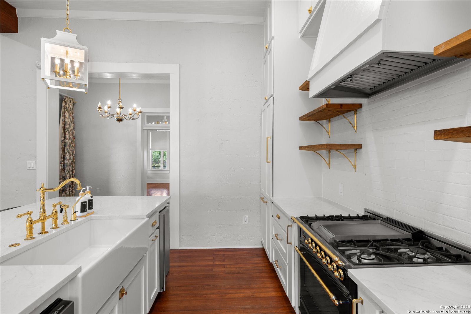 504 6th Street Comfort, TX 78013 - Photo 15 of 48 a kitchen with a stove and a refrigerator