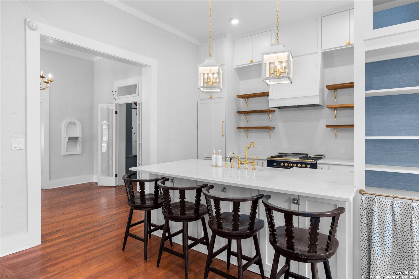 504 6th Street Comfort, TX 78013 - Photo 16 of 48 a kitchen with a table and chairs in it