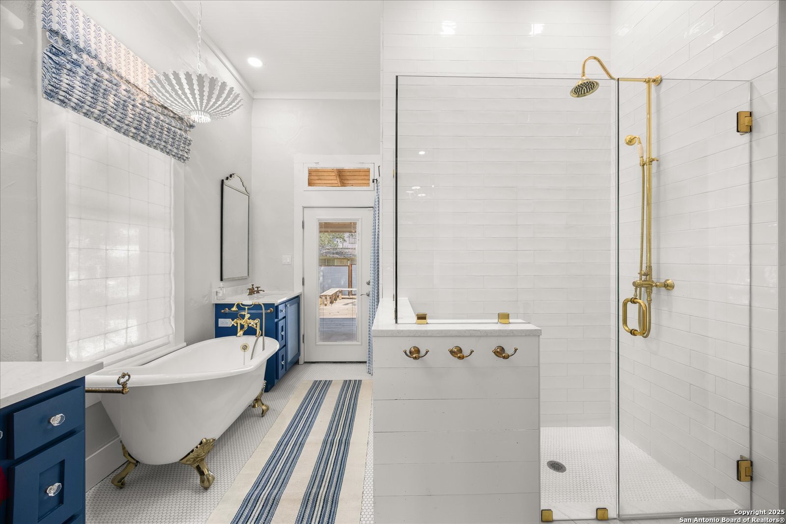 504 6th Street Comfort, TX 78013 - Photo 20 of 48 a spacious bathroom with a bathtub and a shower