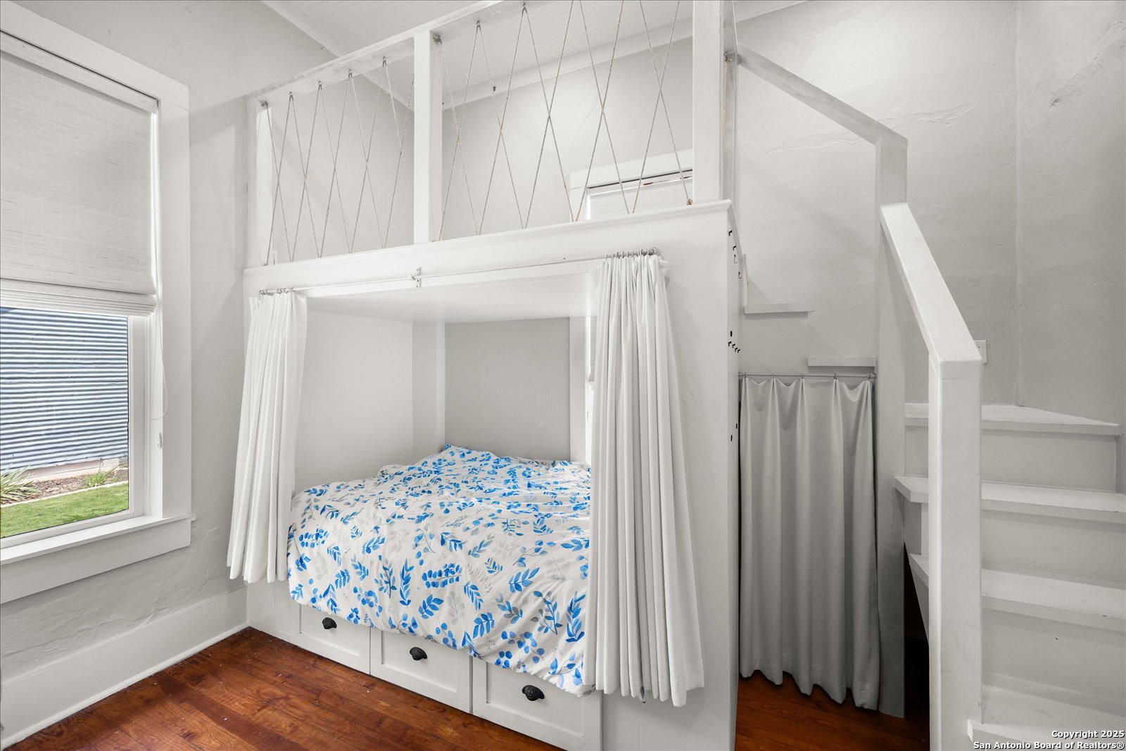 504 6th Street Comfort, TX 78013 - Photo 27 of 48 a view of bedroom with wooden floor
