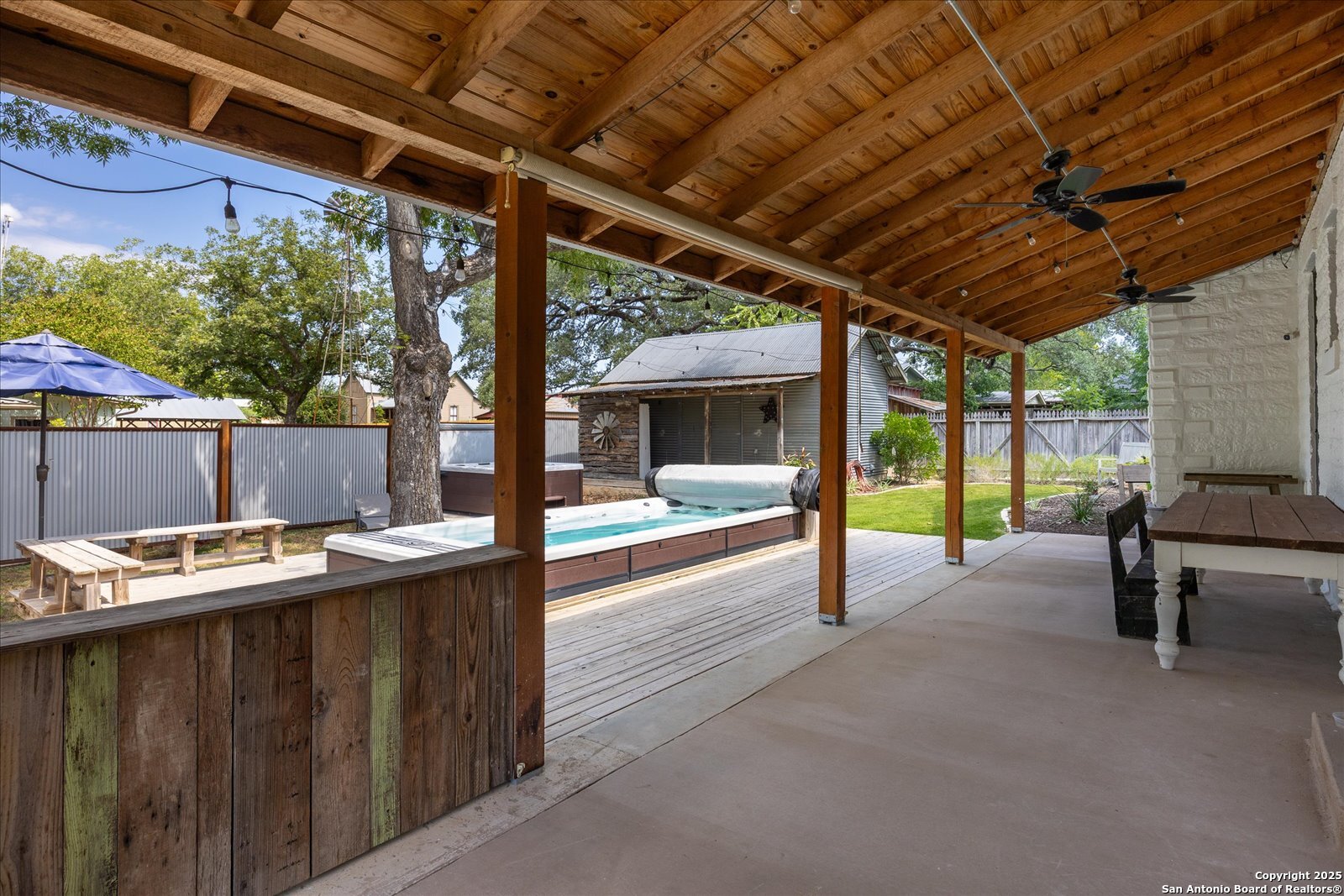 504 6th Street Comfort, TX 78013 - Photo 35 of 48 a view of a patio with a table and chairs