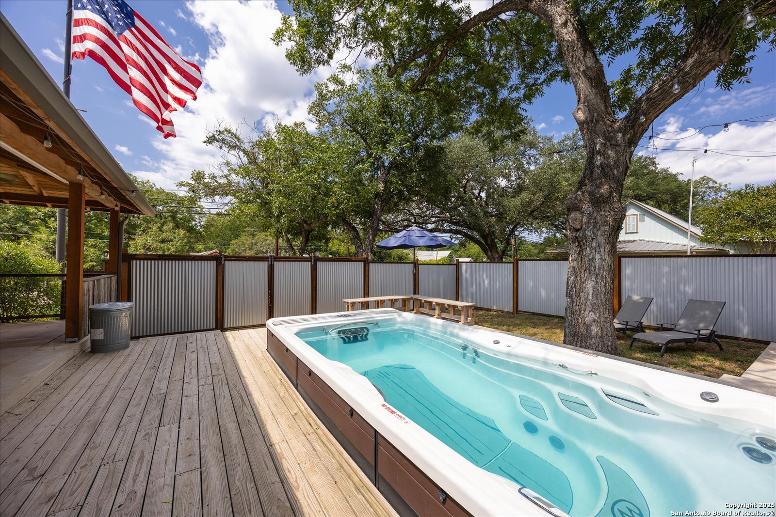 504 6th Street Comfort, TX 78013 - Photo 36 of 48 a view of backyard with a deck and wooden floor