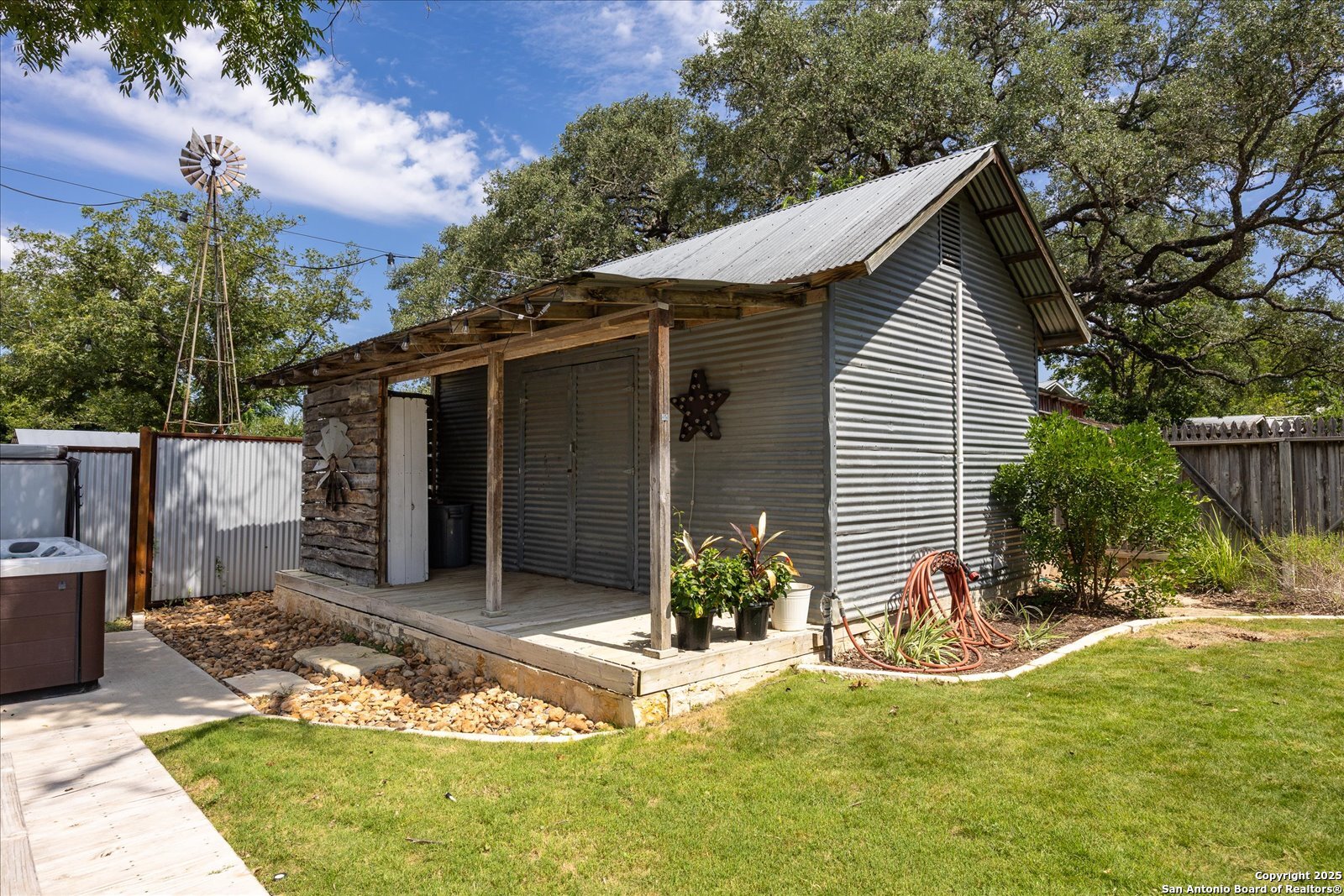 504 6th Street Comfort, TX 78013 - Photo 41 of 48 a view of a house with backyard and sitting area