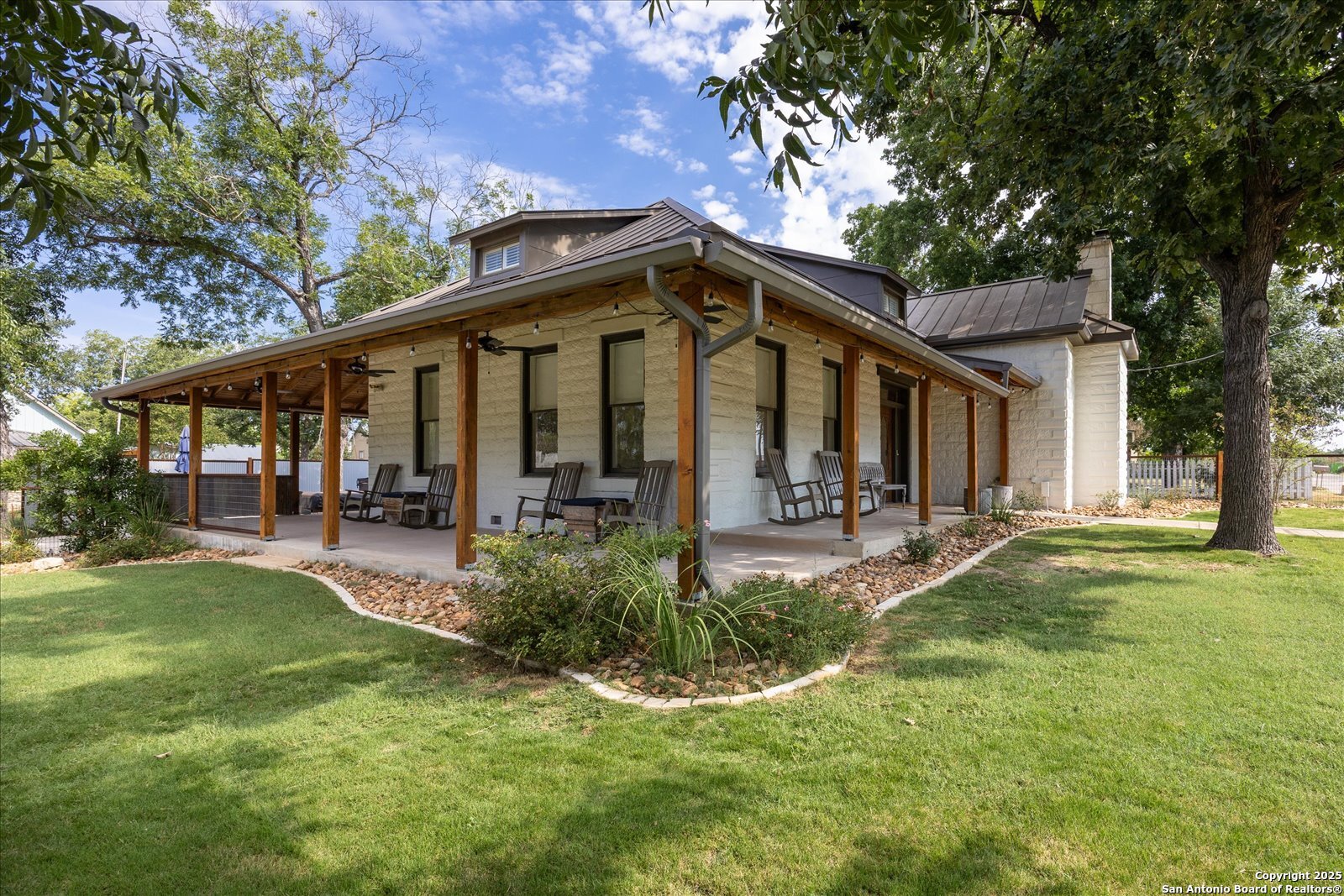 504 6th Street Comfort, TX 78013 - Photo 47 of 48 a view of a house with backyard and sitting area