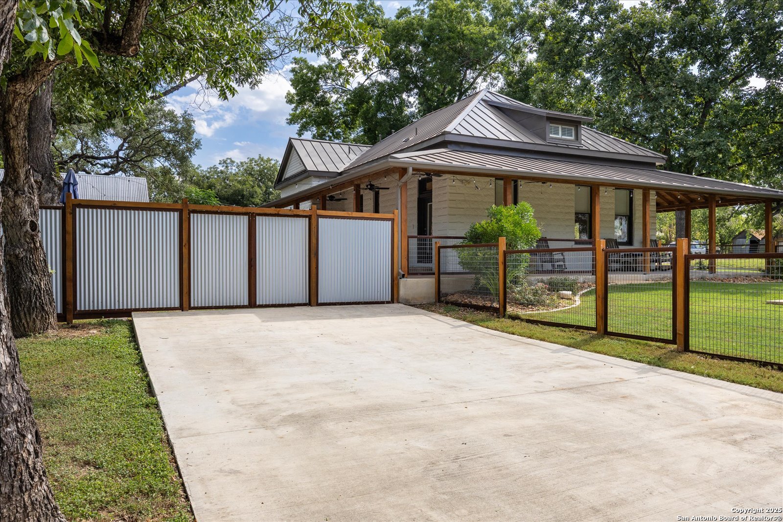 504 6th Street Comfort, TX 78013 - Photo 48 of 48 a front view of a house with a yard